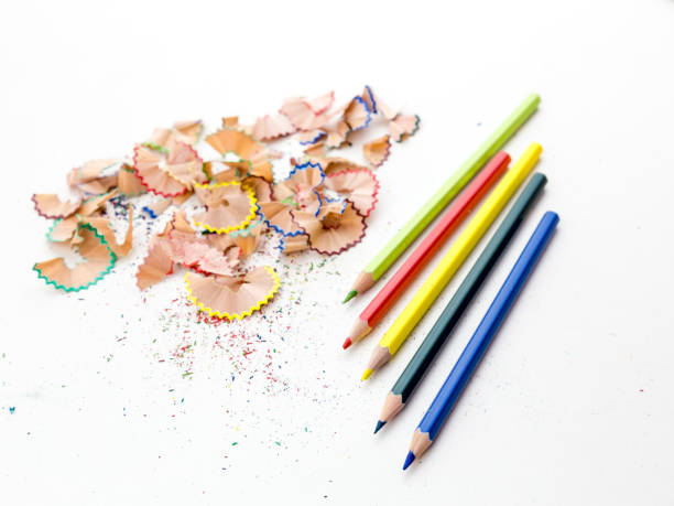 istock Colored pencil crayons in a row with shavings 1427624599