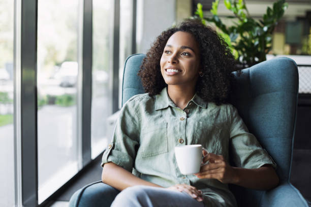 istock Woman relaxing in cafe, has coffee break 1427627674