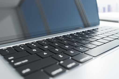 Close up of modern black laptop keyboard and screen with window reflection. 3D rendering