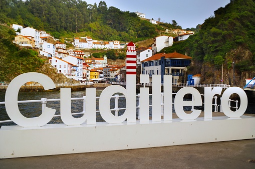 Cudillero, a small fishing village located in Asturias. With its colourful hanging houses belonging to the working sailors.