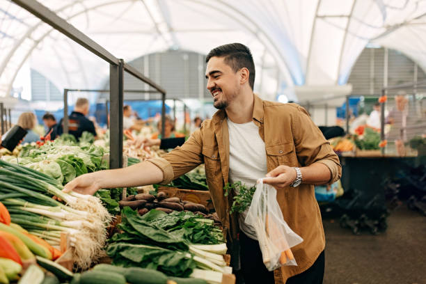 istock The man behind the vegetable stand. 1427634895