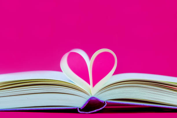istock Pages of a book curved into a heart shape. 1427639352