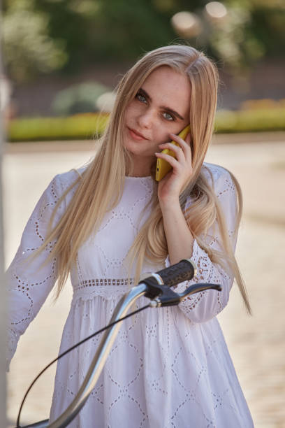 istock woman with phone 1427639399