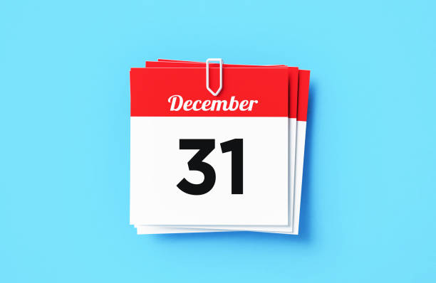 December 31 Calendar Blue Background December 31 calendar sitting on blue background. Horizontal composition with copy space. Directly above. New year's eve concept. december 31 stock pictures, royalty-free photos & images