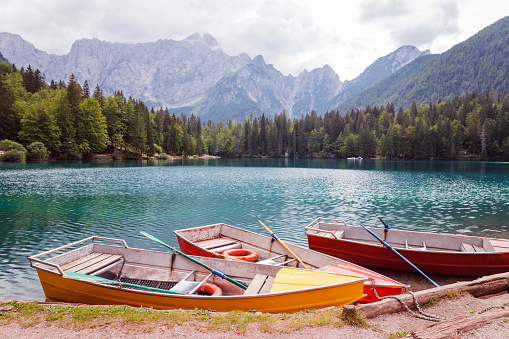 Boats parked on a Laghi di Fusine
