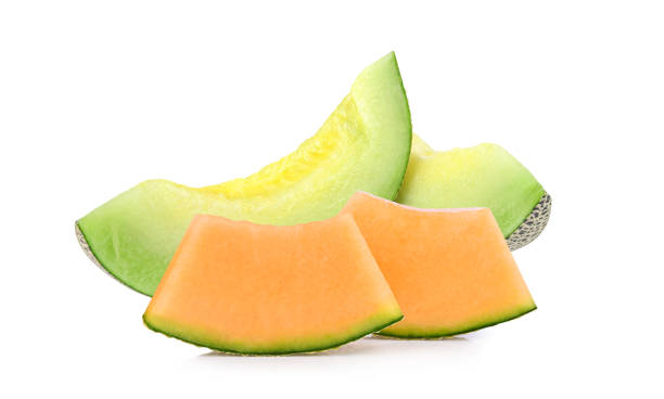 Slices of cantaloupe melon isolated on white