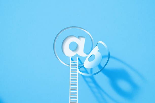 White ladder leaning onto blue at symbol which folds on white background. Horizontal composition with copy space.