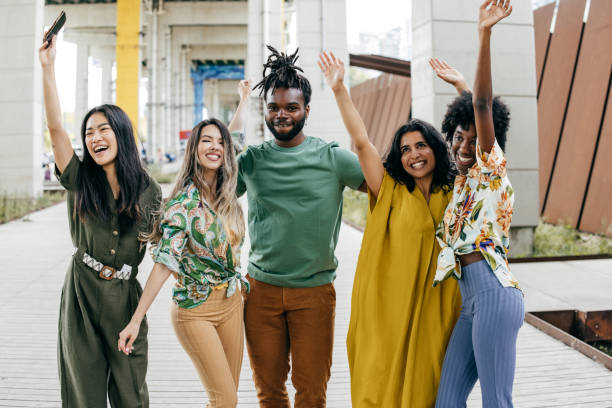 istock Dancing young group of friends 1427655596