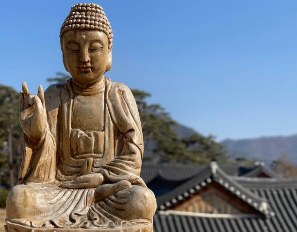 istock Buddha statue, wood, temple. 1427656918