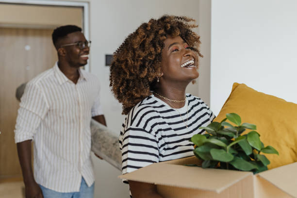 istock Young couple moving in new apartment 1427657226