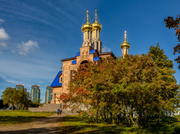 istock September autumn landscape with a church. 1427661756