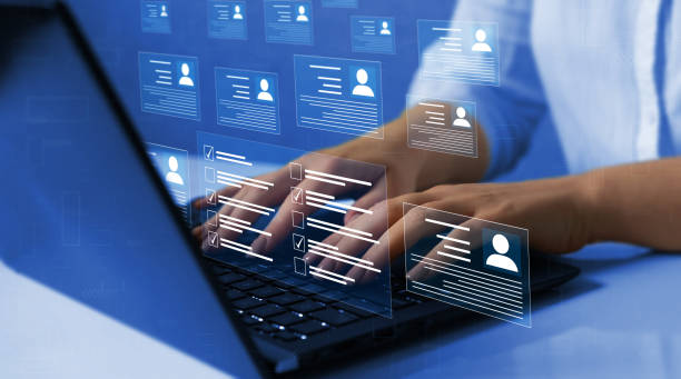 istock Human resources and management. Employees must complete the online survey form, answer the test questions.Marked checklist on a clipboard. 1427662201