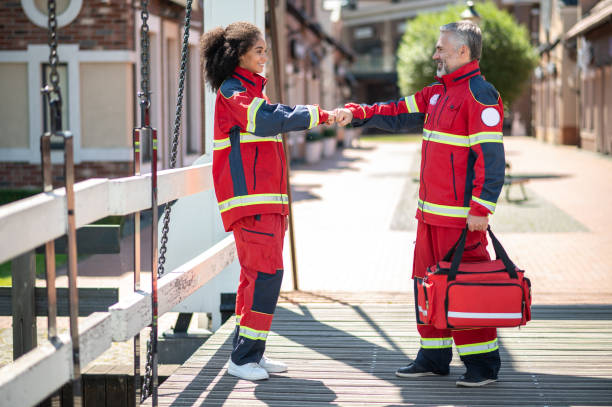 istock Paramedical staff greeting one another on the street 1427662438