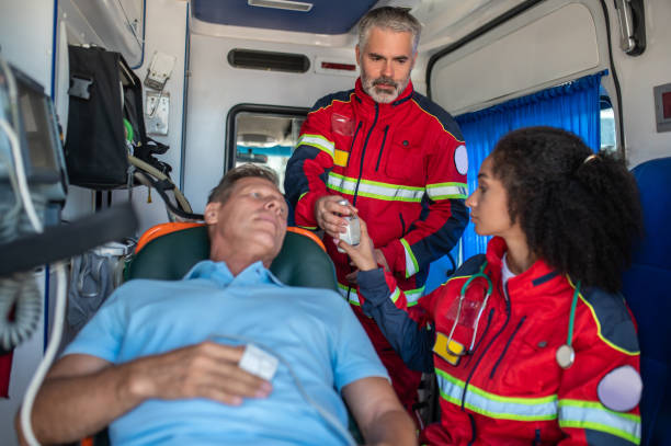 istock Paramedical personnel getting the man ready for the IV drip 1427662563