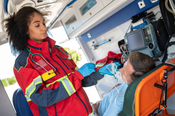 istock Ambulance doctor preparing a respiratory patient for oxygen therapy 1427662601
