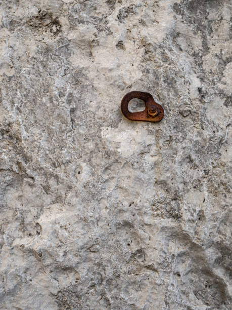 istock Old and rusty safety nail on a climbing route. 1427668213
