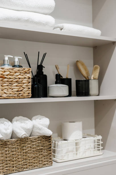 istock Cosmetics, towels and toothbrushes in open shelf case at bathroom 1427671476