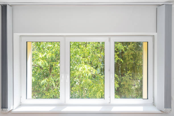 istock pvc window and vertical blinds in apartment room 1427671718