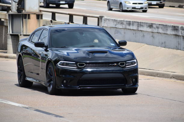 Black Dodge Charger on Gulf Freeway, Interstate 45 (1-45) in Houston, Tx Dodge cruising on I-45 in Houston, Texas 2022 dodge charger stock pictures, royalty-free photos & images