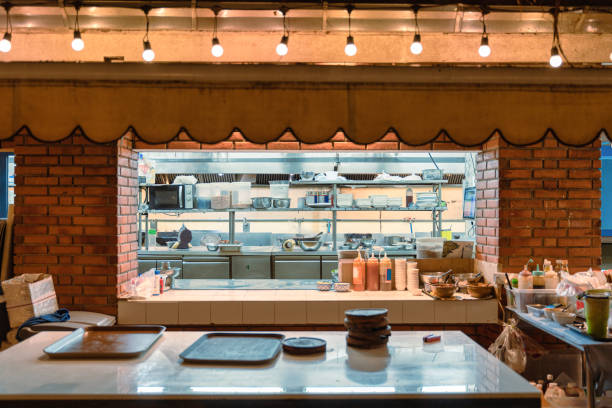 istock Central kitchen with stainless shelf, counter bar, kitchenware, ingredient, raw material at the restaurant 1427672524