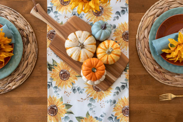 istock Top view of pretty fall tablescape with colorful pumpkins 1427675251