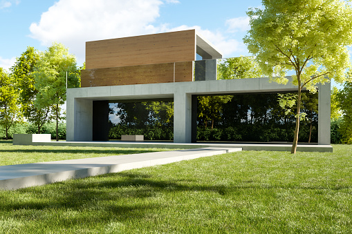 Modern concrete house with garden. 3D generated image.