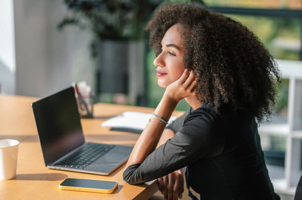 istock Pretty young businesswoman working in the office 1427678607