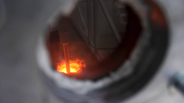 Close up of small window inside metal barrier for observing melting process, modern technologies concept. Stock footage. Melting furnace during working process. Close up of small window inside metal barrier for observing melting process, modern technologies concept. Melting furnace during working process. coke coal stock pictures, royalty-free photos & images