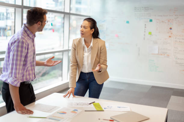 istock Multiracial work colleagues having meeting in modern business office 1427685022
