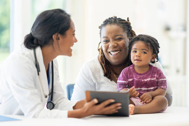istock Mother with her Son at the Doctors 1427685236