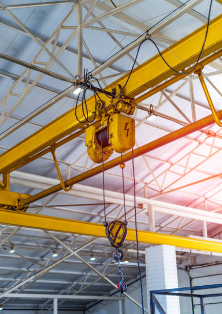 istock Heavy construction crane indoor. Factory transportation machinery. 1427687364