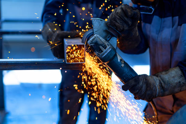 istock Heavy industry engineering factory with industrial worker. In safety uniform manuifacturing. 1427687391