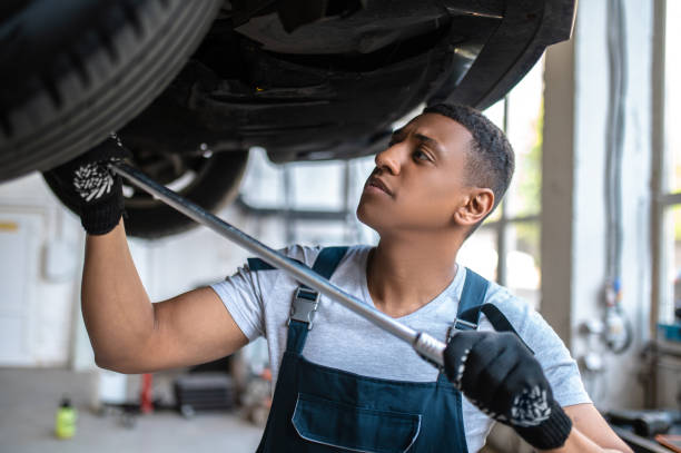 istock Experienced auto technician repairing the client vehicle 1427687571