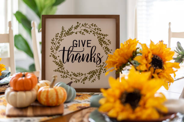 Give Thanks Sign on a Dining Table Decorated for Autumn stock photo
