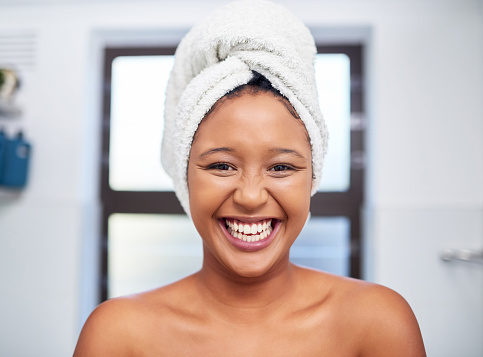 Skincare, face portrait and beauty black woman in bathroom body wellness, self love and hygiene. Youth, glow and soft skin care of African girl, person or model with self care routine in the morning