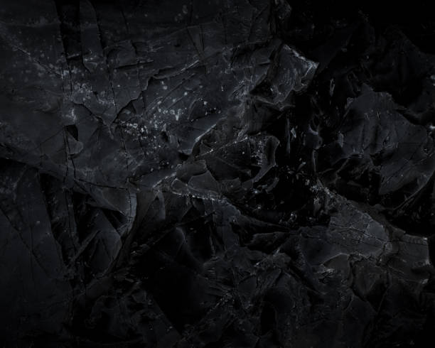 istock Dark marble. Black texture. Stone background. Rock texture. Rock surface with cracks. Rock pile. Paint spots wall. Grunge Rough structure. Abstract texture. 1427691094