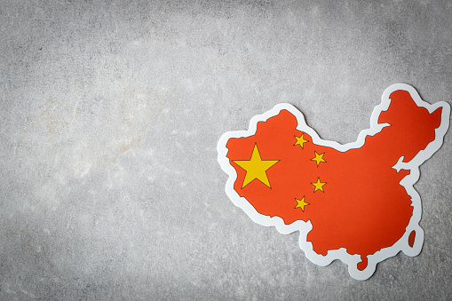 China flag and shape on gray background, copy space,