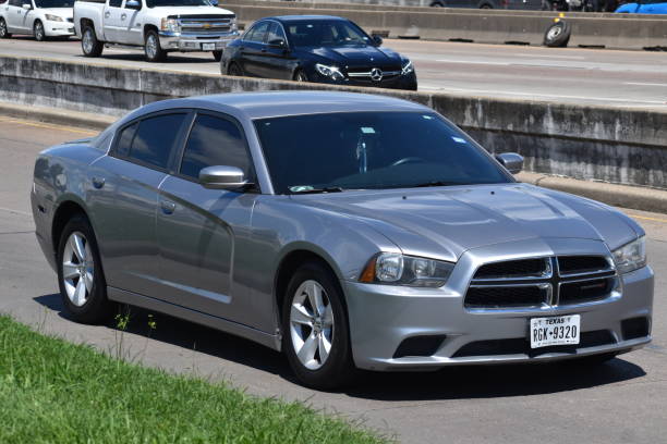 Dodge Charger sedan on Gulf Freeway, Interstate 45 (1-45) in Houston, Tx Dodge cruising on I-45 in Houston, Texas 2022 dodge charger stock pictures, royalty-free photos & images