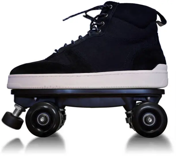 Photo of Clipping isolated photography on white background of a roller skate quad mounted on high-tops sneakers.