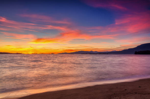 istock sunset glow view from English Bay, Vancouver, BC, Canada 1427697333