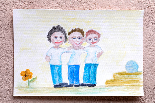 Watercolor child painting of three best friends on a table