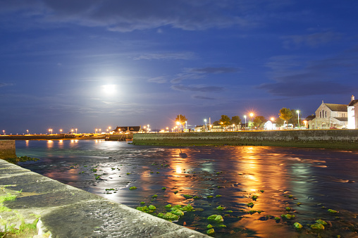 Looking across the River Corrib at night