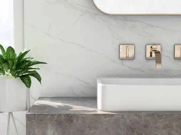 Minimal and luxury design of bathroom vanity with gray granite counter top, white rectangle ceramic washbasin, round mirror and houseplant with sunlight from window on marble wall for personal care and toiletries product display