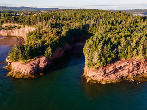 Aerial sunset view of St Martins Sea Caves Beautiful sunset view of St Martins Sea Caves at Fundy national park Canada from above st. martins stock pictures, royalty-free photos & images