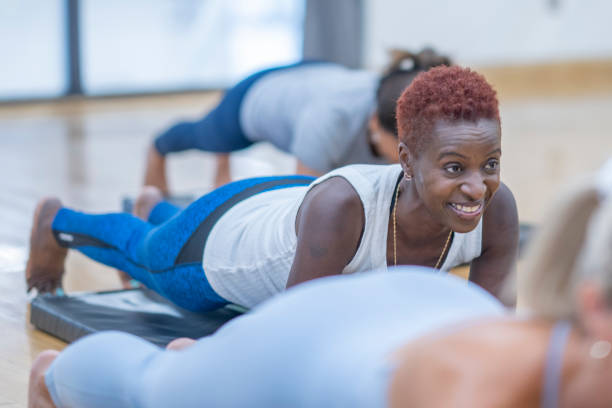 istock Senior Planking in a Fitness Class 1427711614