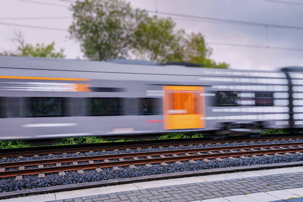 istock A modern high speed intercity train carries passengers. Public transport and technology. Blur in motion. 1427716717