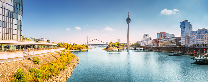 Cityscape panoramic View of the Dusseldorf TV Tower from the Media Harbor. Travel landmark and urban sightseeing in Germany