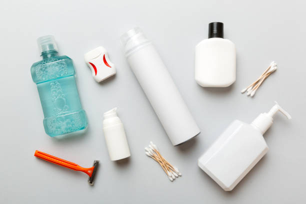 istock Mockup for bathing products top view flat lay, spa razor, toothpaste, soap, gel and other various accessories. Cosmetics for skin health. Bath Mockup for your logo 1427719641