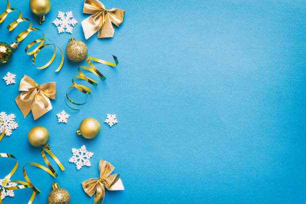istock New Year composition white christmas snowflakes. Christmas decor background with pine cones. Top view with copy space 1427719767
