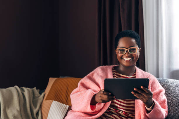 istock Woman Reading A Book On A Christmas Day 1427719846